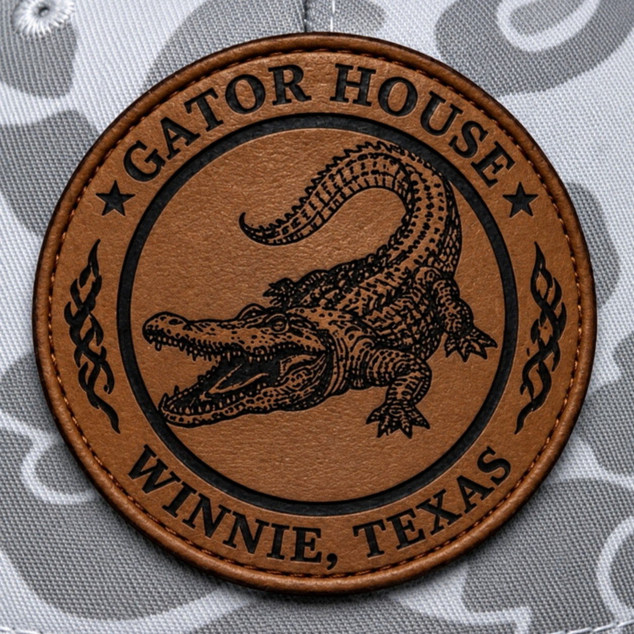 The Gator House leather patch logo, with an alligator and Winnie, Texas lettering